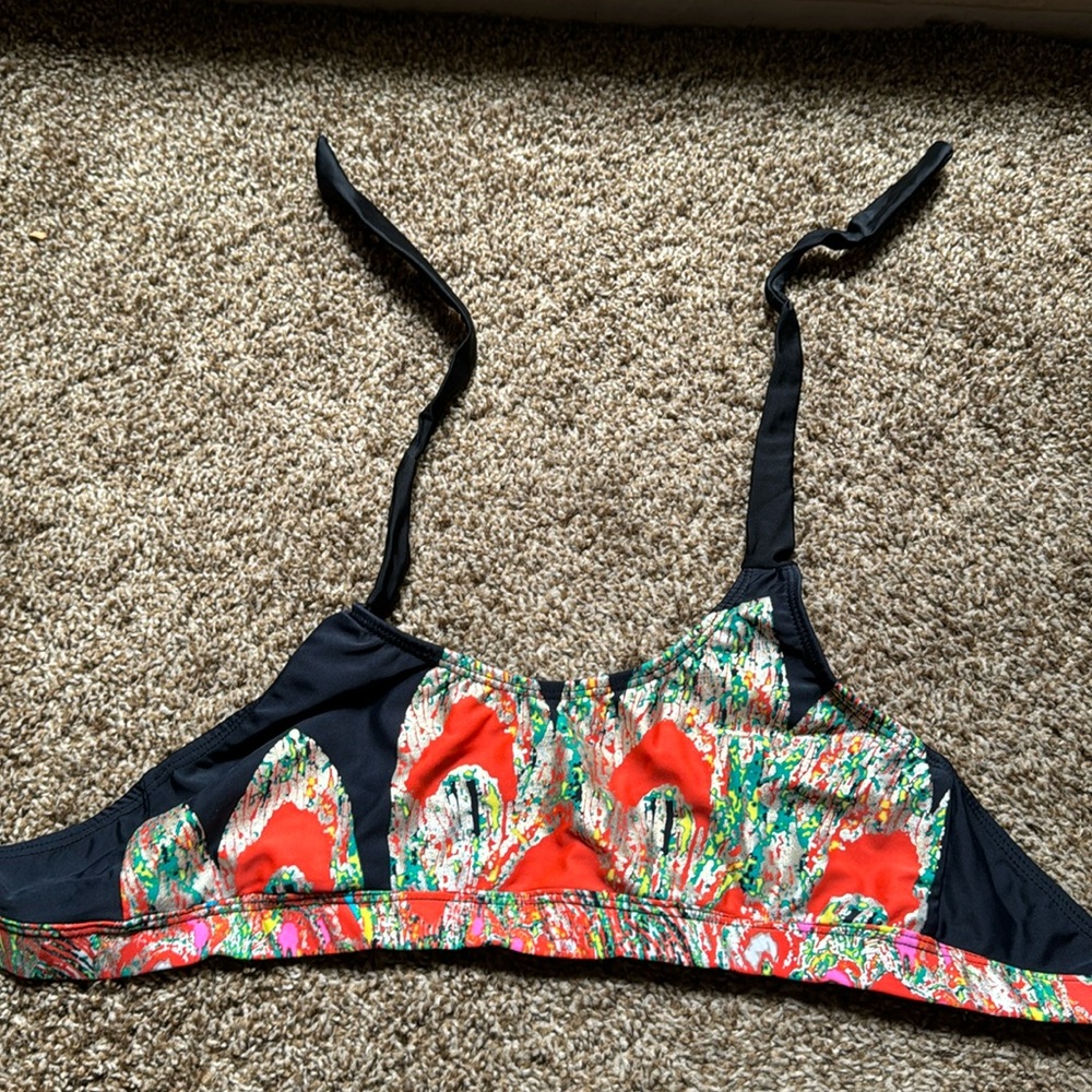 Gold/orange print with black swimsuit top